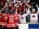 Members of Team Canada celebrate the second period goal by Taylor Hall #4 of Team Canada during the 2010 IIHF World Junior Championship Tournament Gold Medal game on January 5, 2010 at the Credit Union Centre in Saskatoon, Saskatchewan, Canada. (Saskatoon StarPhoenix).