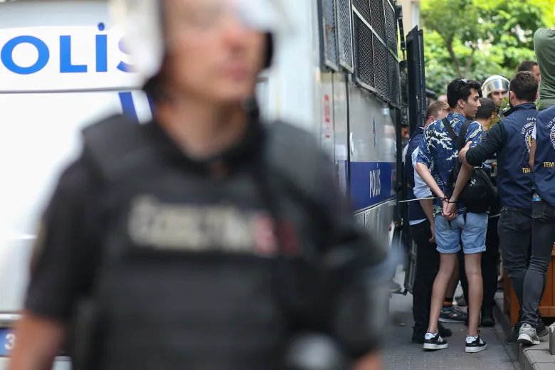 A man is detained during the LGBTQ Pride March in Istanbul, Turkey, Sunday, June 26, 2022. Dozens of people were detained in central Istanbul Sunday after city authorities banned a LGBTQ Pride March, organisers said. (AP Photo/Emrah Gurel)