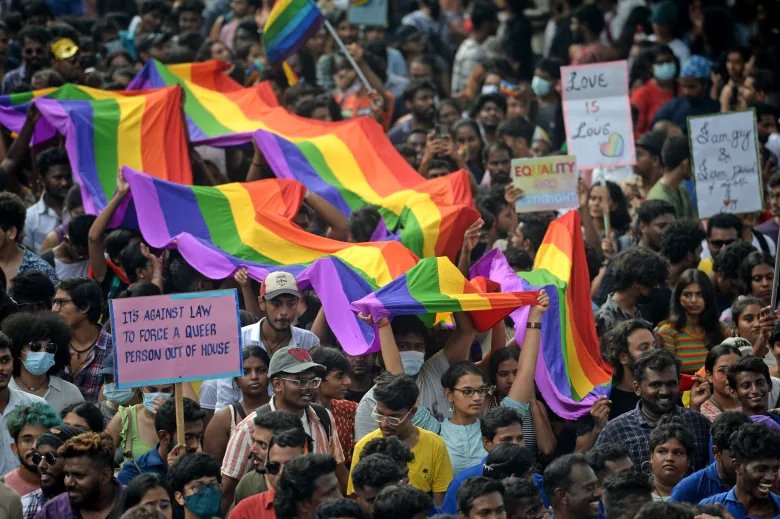 Activists and supporters of LGBTQ community walk a pride parade in Chennai on June 26, 2022.