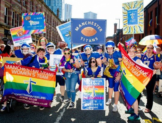 MANCHESTER, ENGLAND - AUGUST 24: Parade goers enjoy Manchester Pride 2019 on August 24, 2019 in Manchester, England. (Photo by Shirlaine Forrest/Getty Images)